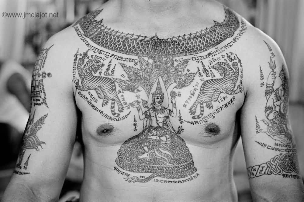 Nice Spiritual Thai Tattoo On Chest And Half Sleeves For Men
