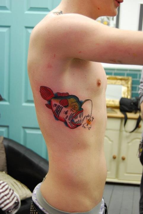 Old School Small Angler Fish Tattoo On Side Rib For Men