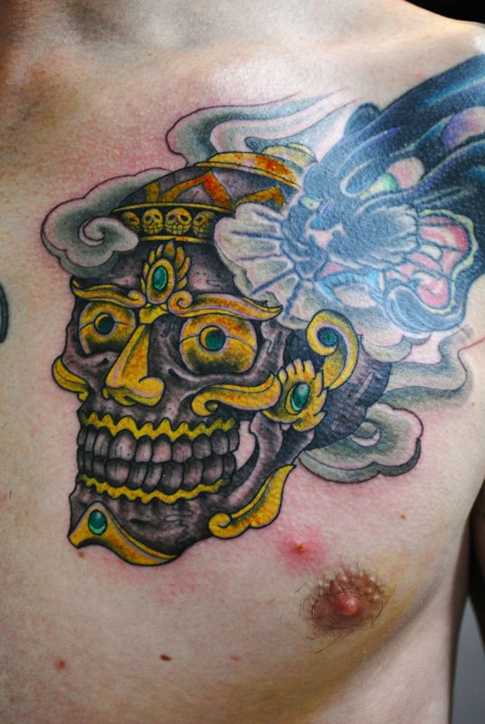 Panther With Tibetan Skull Tattoo On Chest