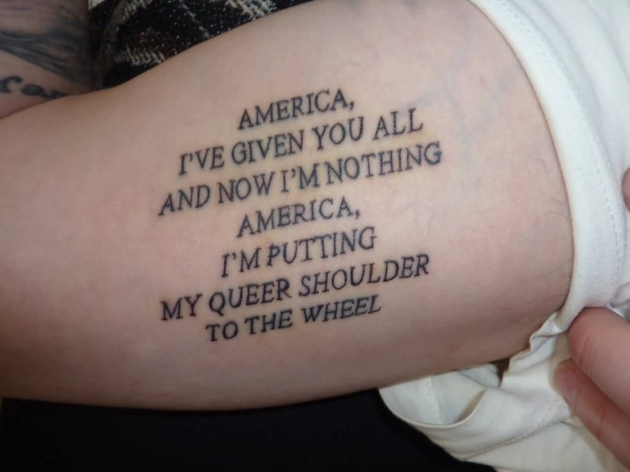 Poem On America Tattoo On Biceps