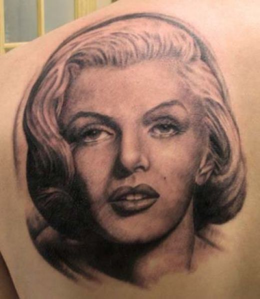 Realistic Grey Marilyn Monroe Tattoo On Left Back Shoulder