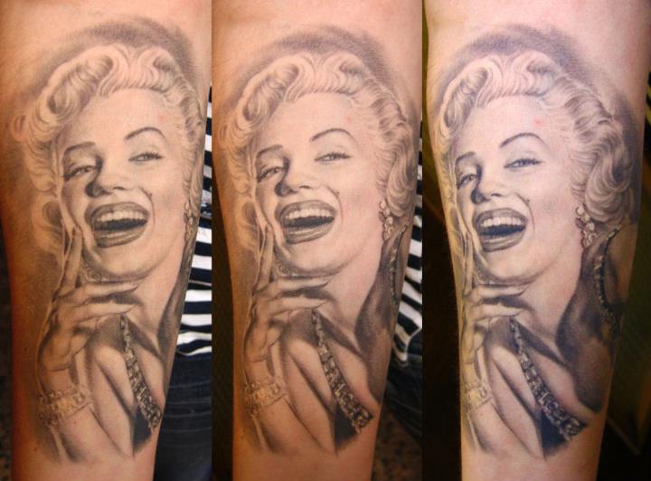 Realistic Laughing Marilyn Monroe Tattoo On Forearm