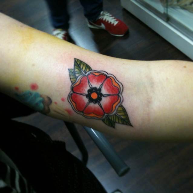 Red Flower Tattoo On Biceps