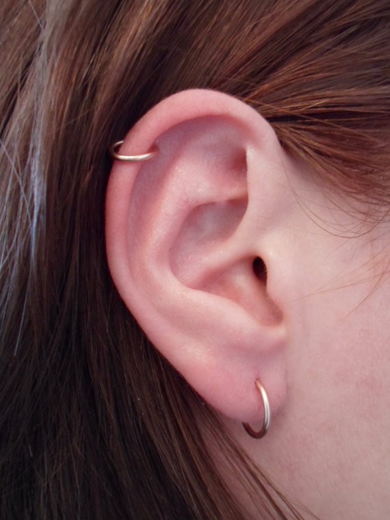 Right Cartilage And Lobe Hoop Ring Piercings