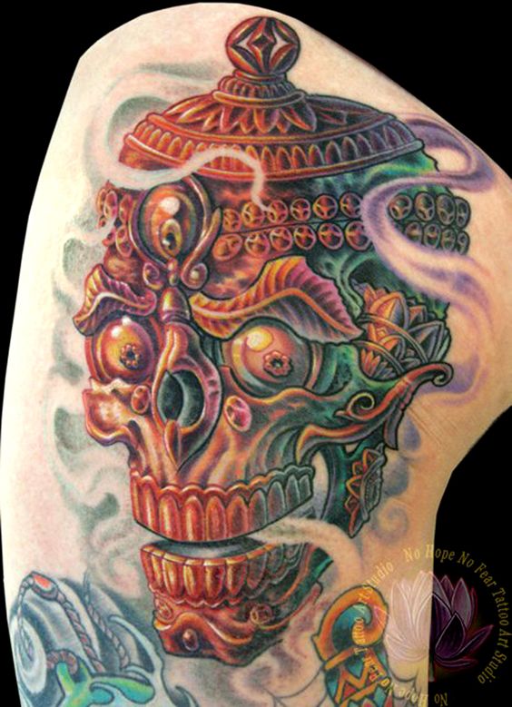 Scary Tibetan Skull With Smoke Tattoo By James Kern