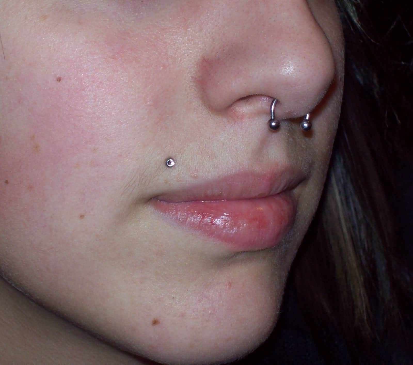 Septum Circular Barbell And Right Monroe Piercing For Girls.