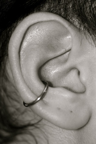 Silver Hoop Ring Conch Piercing On Right Ear