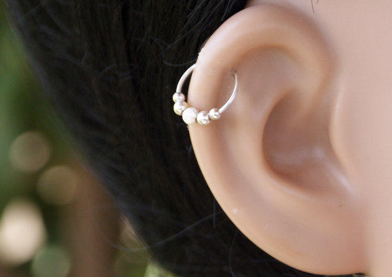 Silver Hoop Rings Piercing On Right Ear