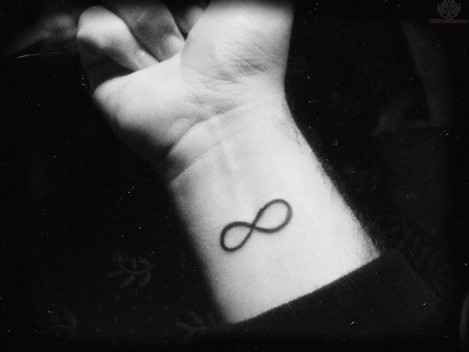 Simple Infinity Symbol Wrist Tattoo