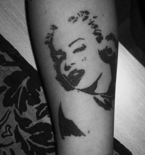 Simple Marilyn Monroe Tattoo On Arm