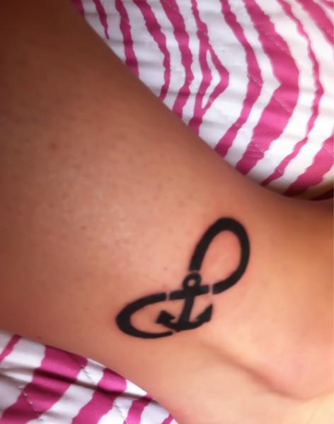 Small Black Infinity Anchor Tattoo On Ankle