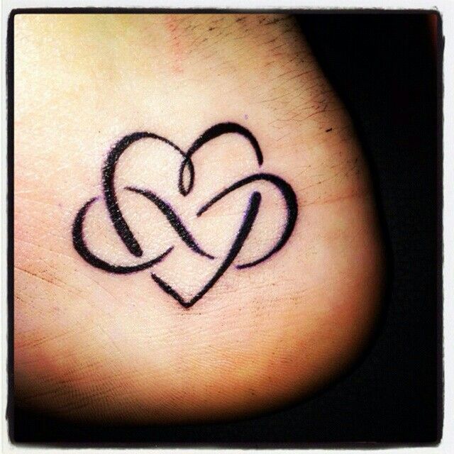 Small Heart And Infinity Sign Tattoo On Heel