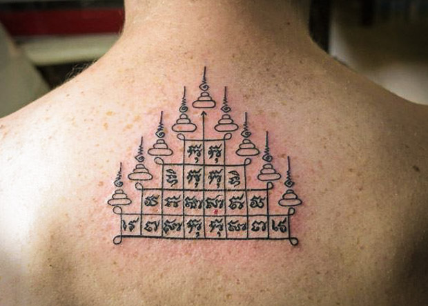 Small Thai Temple Tattoo On Upper Back