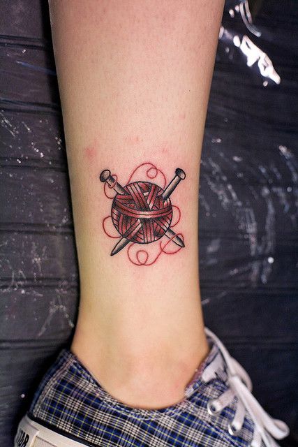Small Yarn Ball And Knitting Needles Tattoo On Ankle