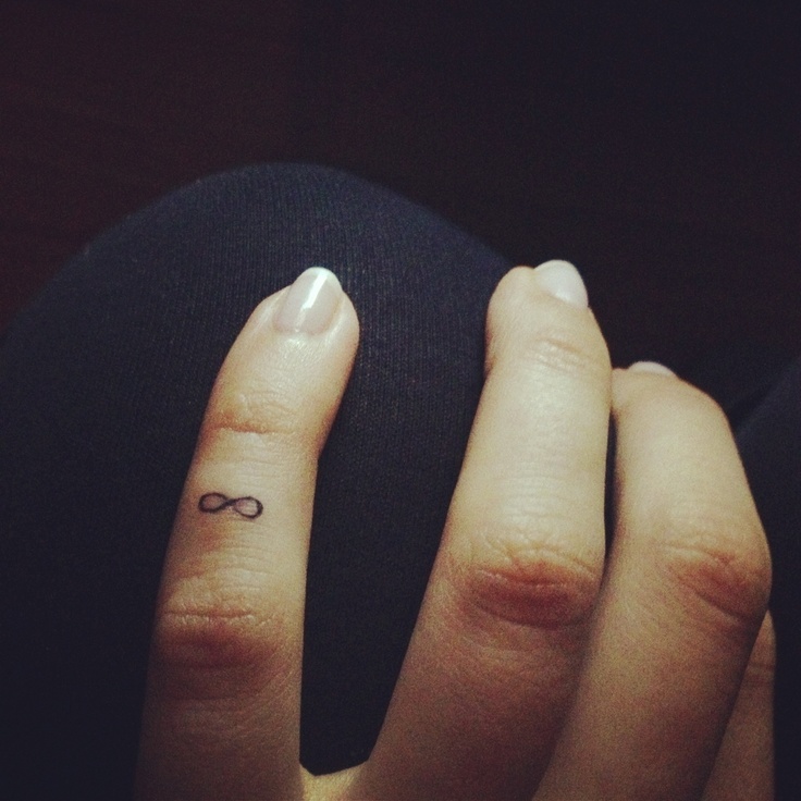 Smallest Infinity Symbol Tattoo On Finger