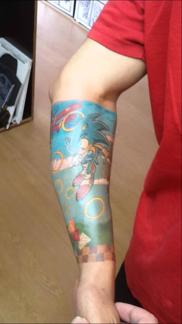 Sonic The Hedgehog Theme Tattoo On Arm Sleeve