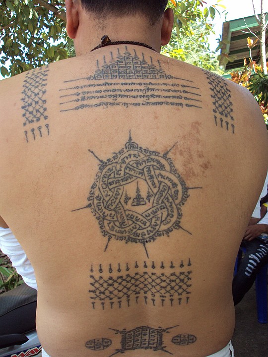 Temple And Muay Thai Tattoo On Full Back