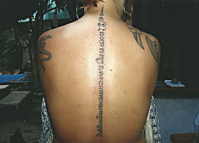 Thai Script Spine Chord Style Tattoo