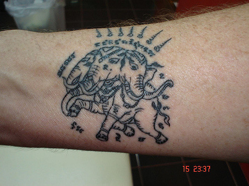 Traditional Thai Elephant With 3 Heads Tattoo On Forearm