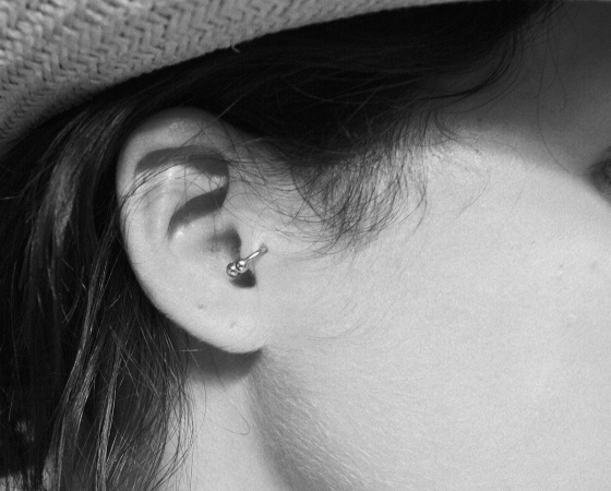 Tragus Piercing With Silver Circular Barbell