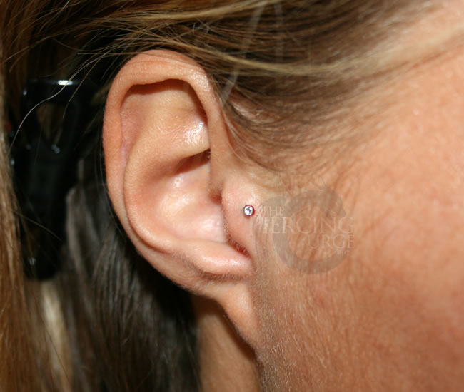 Tragus Piercing With Silver Stud For Girls