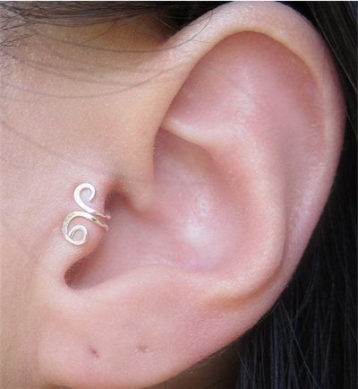Tragus Piercing With Small Silver Cuff