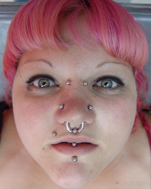 Vertical Labret And Monroe Piercing With Silver Studs
