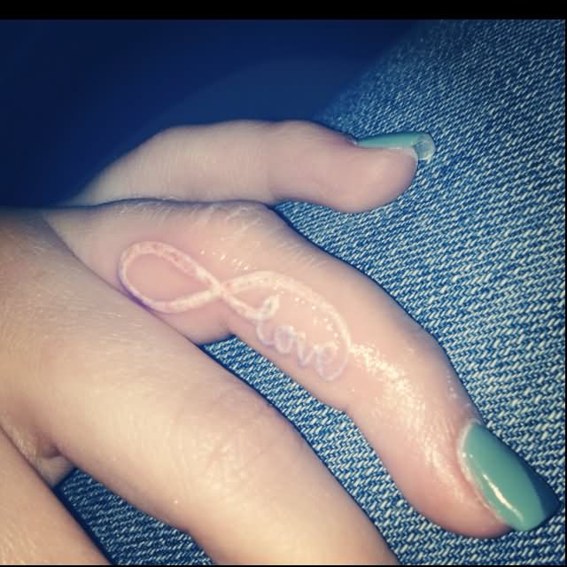 White Ink Infinity Love Tattoo On Finger For Girls