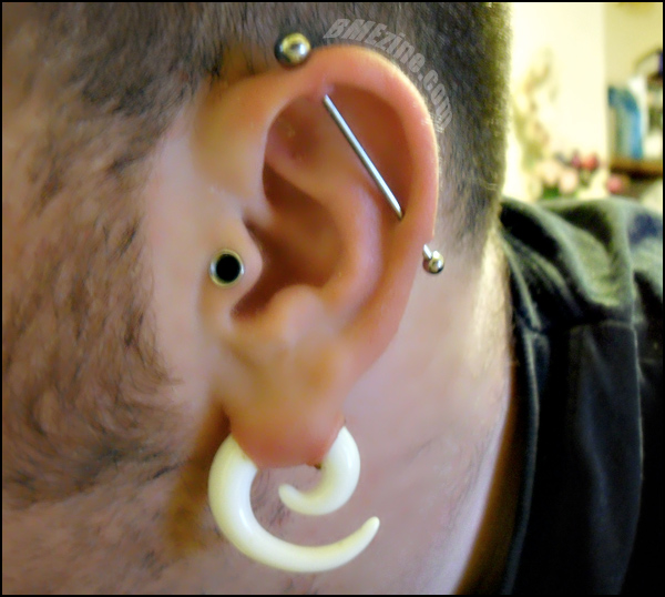 White Spiral Ear Lobe And Ear Project Piercing For Men