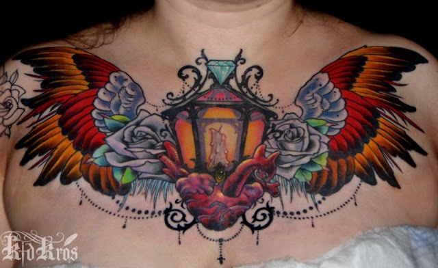 Winged Heart Lantern Tattoo On Chest