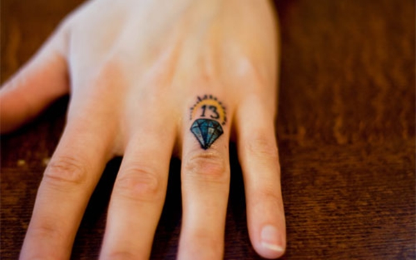 13 Diamond Finger Tattoo