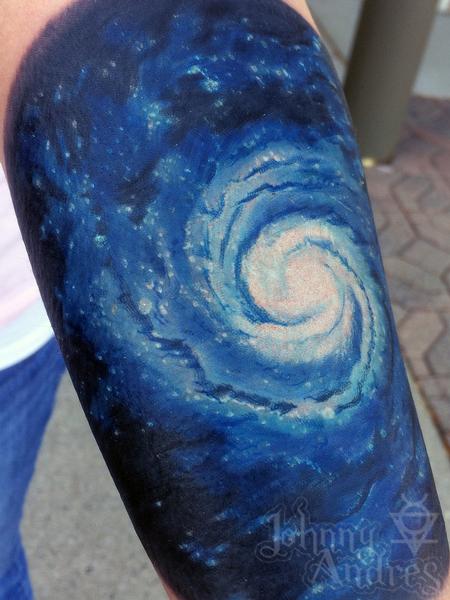 Amazing Blue Spiral Galaxy Tattoo On Arm