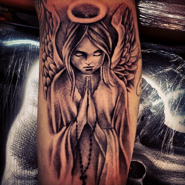 Amazing Grey Ink Praying Angel Tattoo On Sleeve