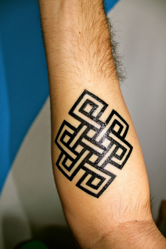 Attractive Endless Knot Tattoo On Forearm
