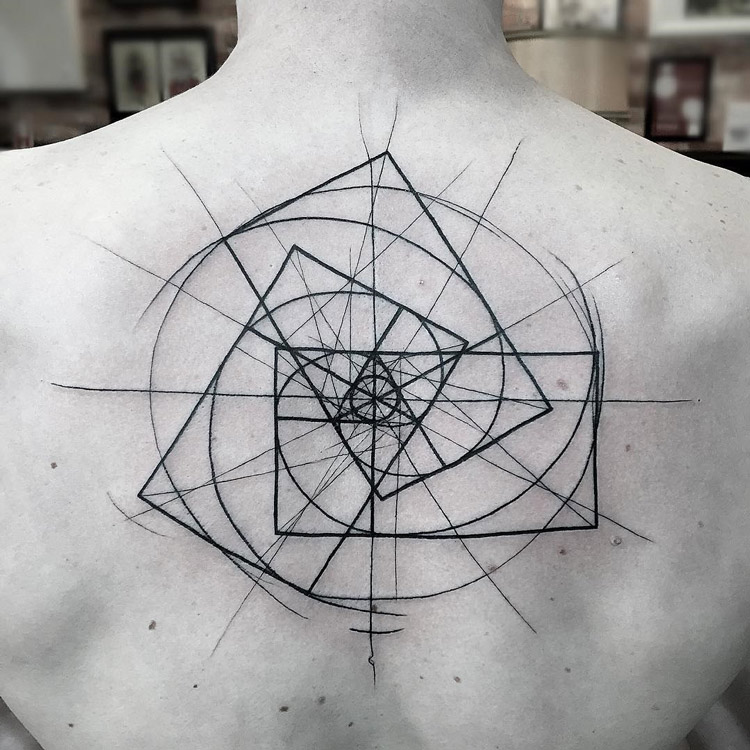 Attractive Geometric Spiral Tattoo On Upper Back