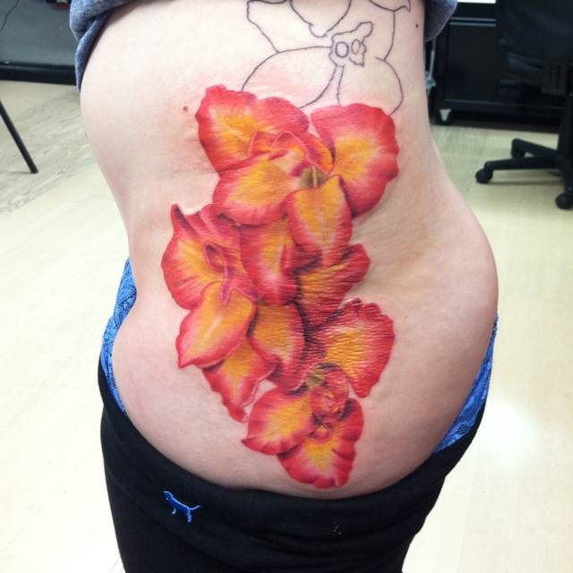 Attractive Gladiolus Flowers Tattoo For Girls