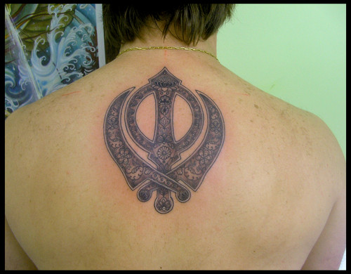 Attractive Sikhism Khanda Punjabi Tattoo On Upper Back