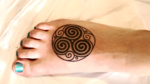 Attractive Spiral Circle Tattoo On Foot