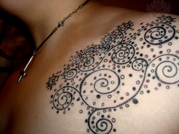Attractive Spiral Tattoo On Left Upper Shoulder For Girls