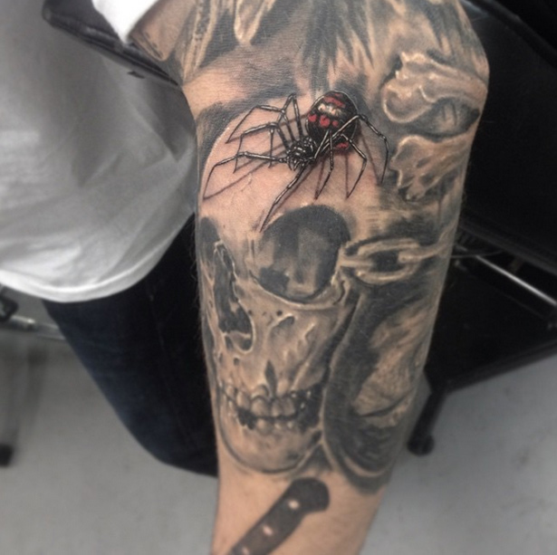 Awesome Black Widow With Skull Tattoo On Sleeve