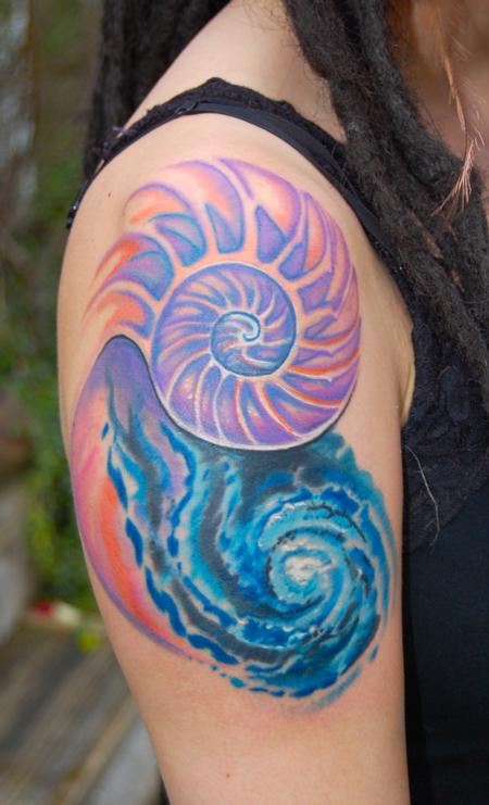 Awesome Spiral Galaxy With Seashell Tattoo On Right Shoulder For Girls