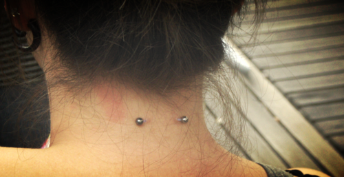 Awesome Surface Back Neck Piercing