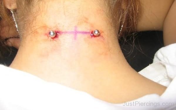 Awesome Surface Neck Piercing With Silver Barbell