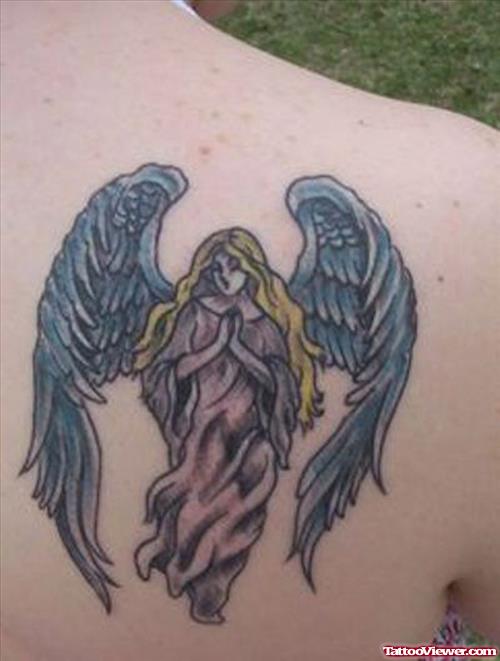 Awful Praying Angel Tattoo On Right Back Shoulder