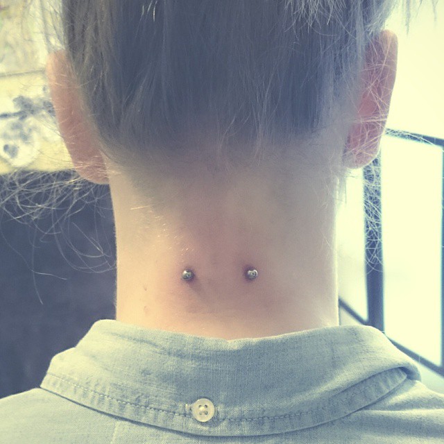 Back Neck Silver Barbell Surface Piercing