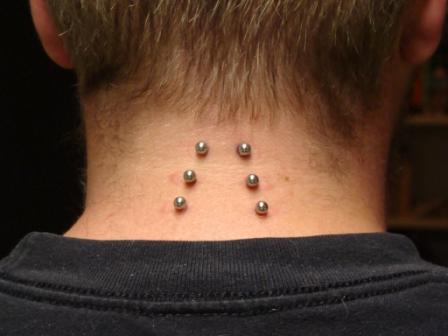 Back Neck Surface Barbell Piercings