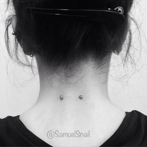 Back Neck Surface Piercing With Silver Barbell