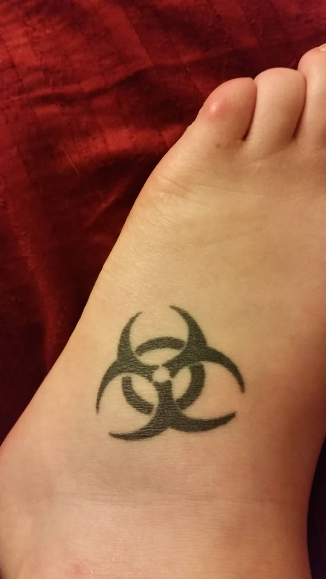 Biohazard Symbol Tattoo On Foot