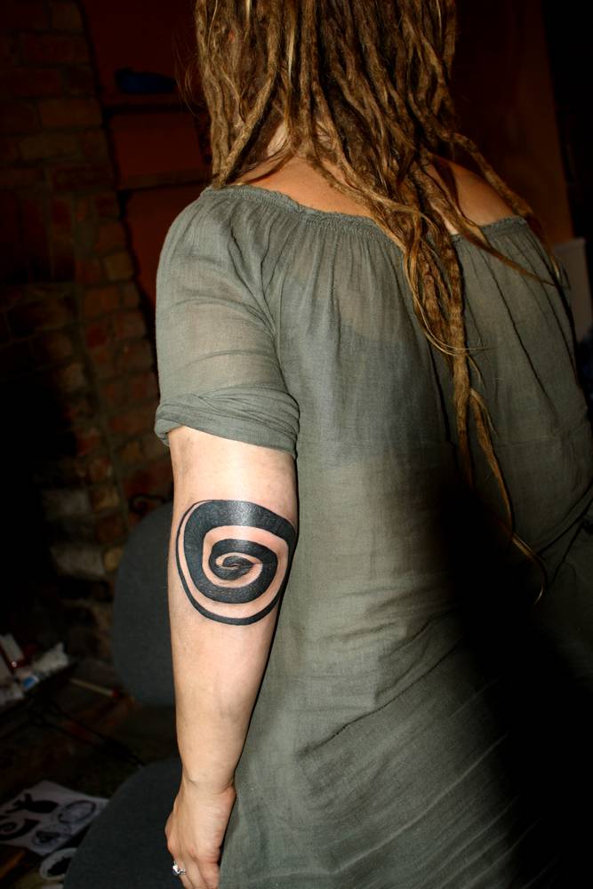 Black And White Spiral Tattoo On Elbow For Girls