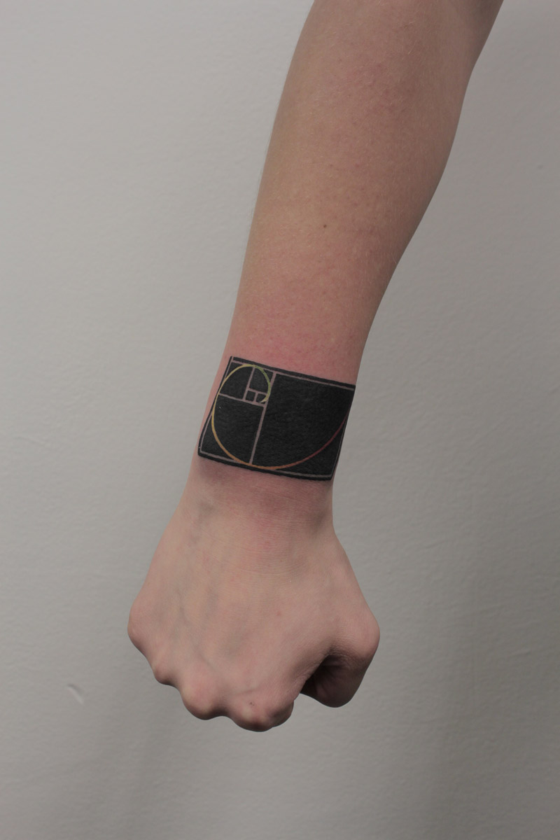 Black Fibonacci Spiral Tattoo On Wrist